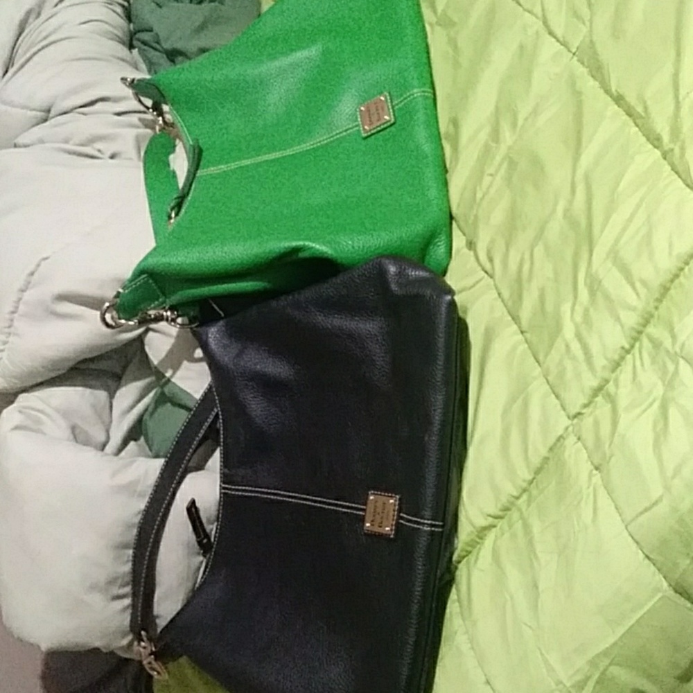 2 dooney and Bourke bags plus an added surprise
